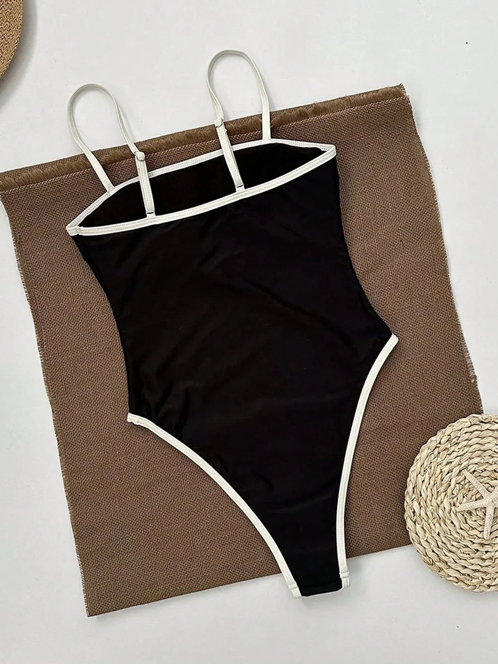 One-Piece Swimsuit in Black with High-Leg Cut and Contrast Detail